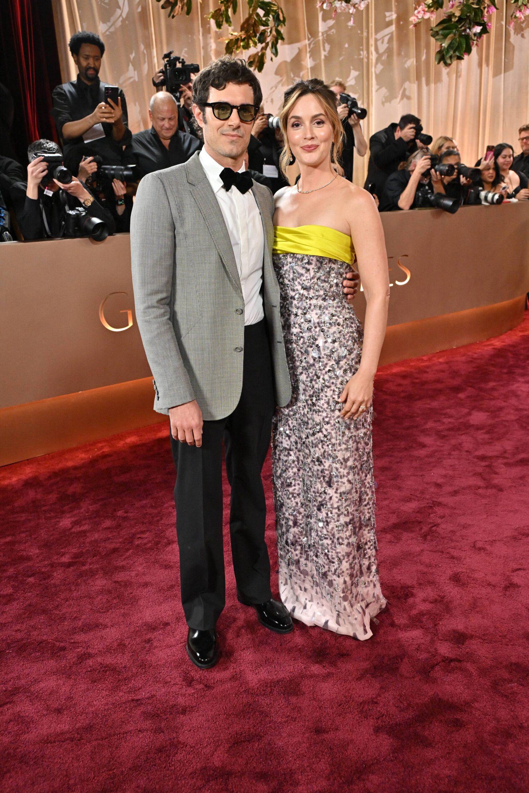 Adam Brody and Leighton Meester — wearing Miu Miu — attend the 83rd Golden Globe Awards at The Beverly Hilton hotel in Beverly Hills on January 11, 2026.
