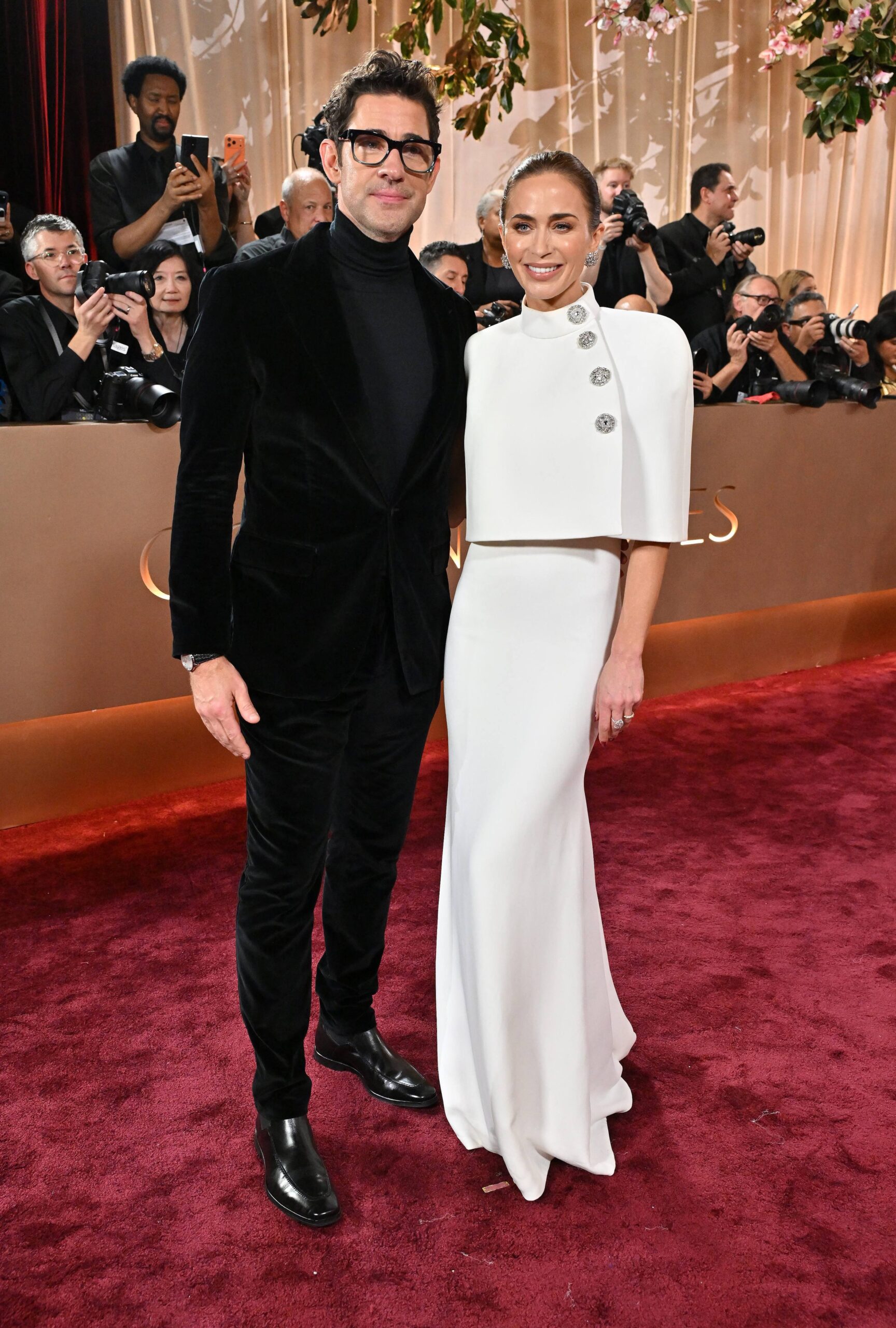 John Krasinski and Emily Blunt — in Louis Vuitton — attend the 83rd Golden Globe Awards at The Beverly Hilton hotel in Beverly Hills on January 11, 2026.
